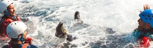 Feel the power of Mediterranean waves during your coasteering experience in Ibiza. Navigate rocky coastlines with crashing waves under professional guidance with full safety equipment provided
