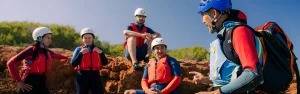 Safe and fun coasteering experience for families in Ibiza. Professional certified guides lead small groups through the adventure with all safety equipment included. Perfect for children and beginners.
